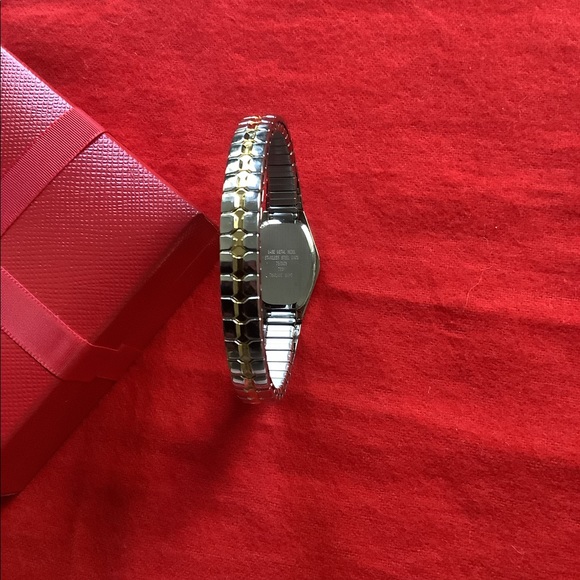 Armitron Woman’s Stretch Silver & Gold Tone Watch - Picture 4 of 6